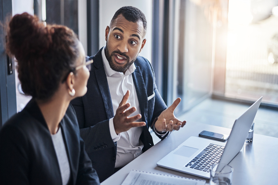 Two business people having a discussion